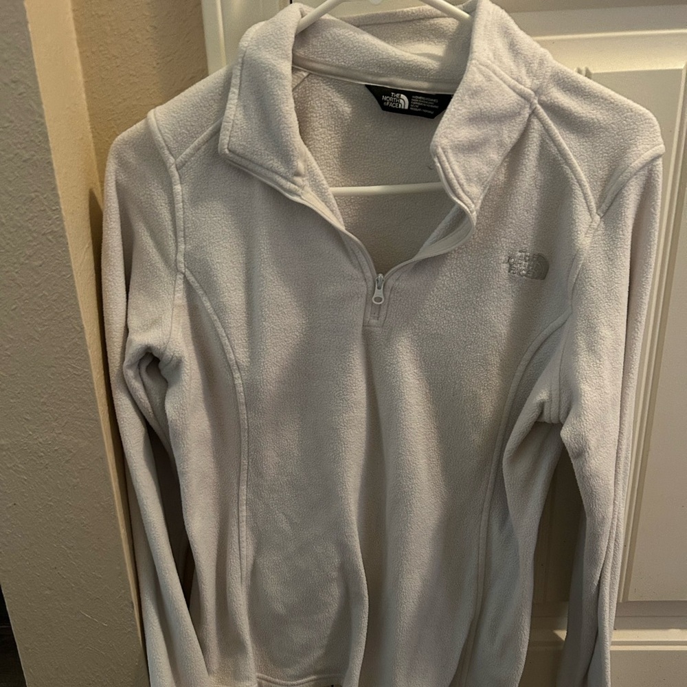 White pull over Northface.